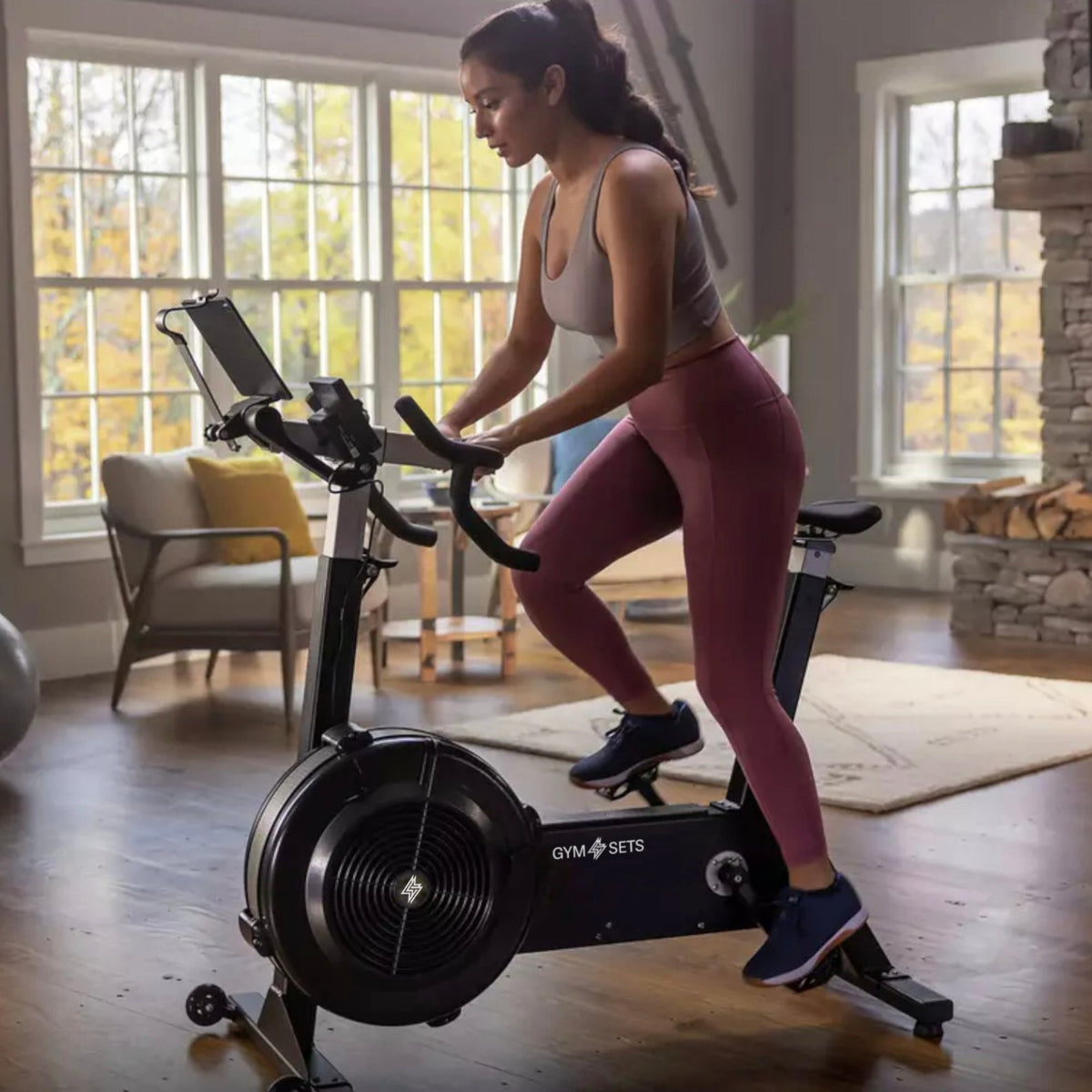 Air resistance exercise bike with freewheel clutch and belt drive - view 10