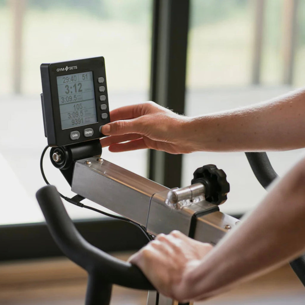 Air resistance exercise bike with freewheel clutch and belt drive - view 6