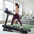 Folding treadmill with thumb-dial controls and hydraulic fold