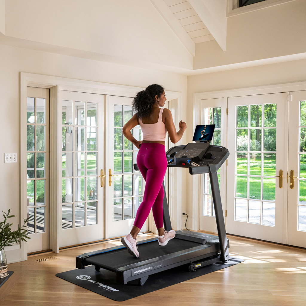 Folding treadmill with thumb-dial controls and hydraulic fold - view 11