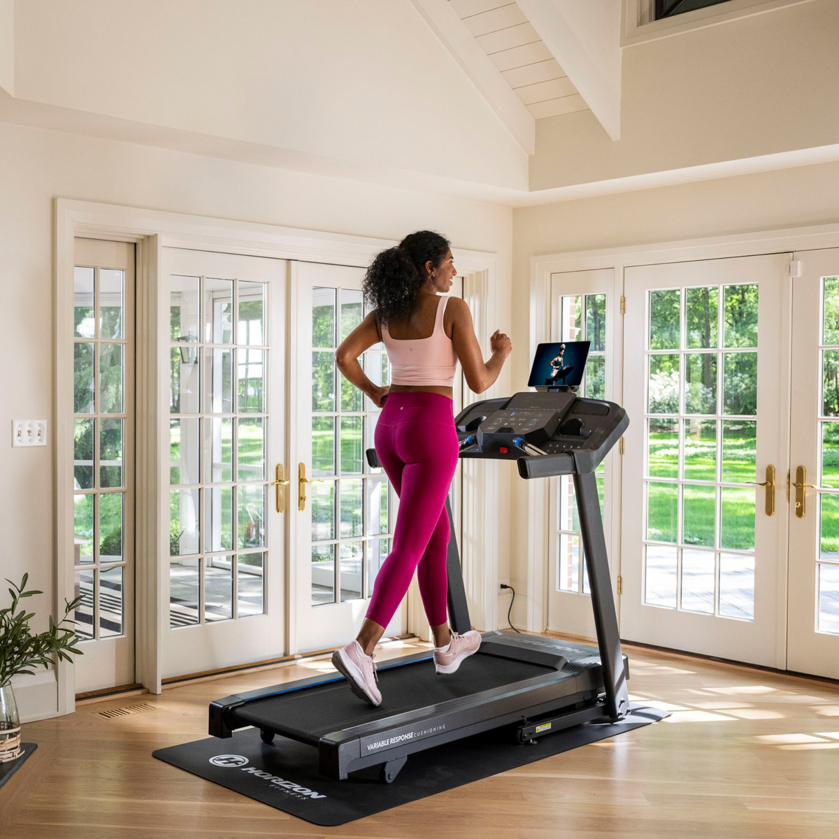 Folding treadmill with thumb-dial controls and hydraulic fold - view 11